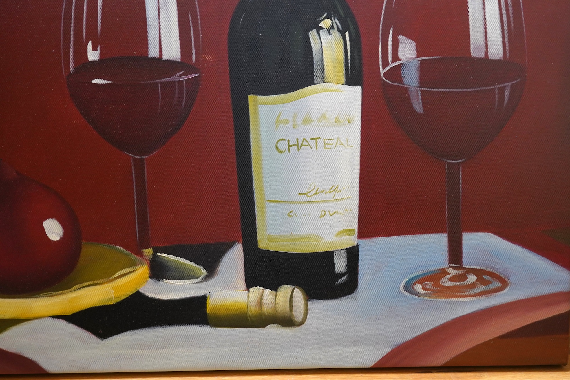 Attributed to Ken Laidlaw (b.1945), Still life of wine and fruit, unsigned, oil on canvas, unframed, 50 x 60cm